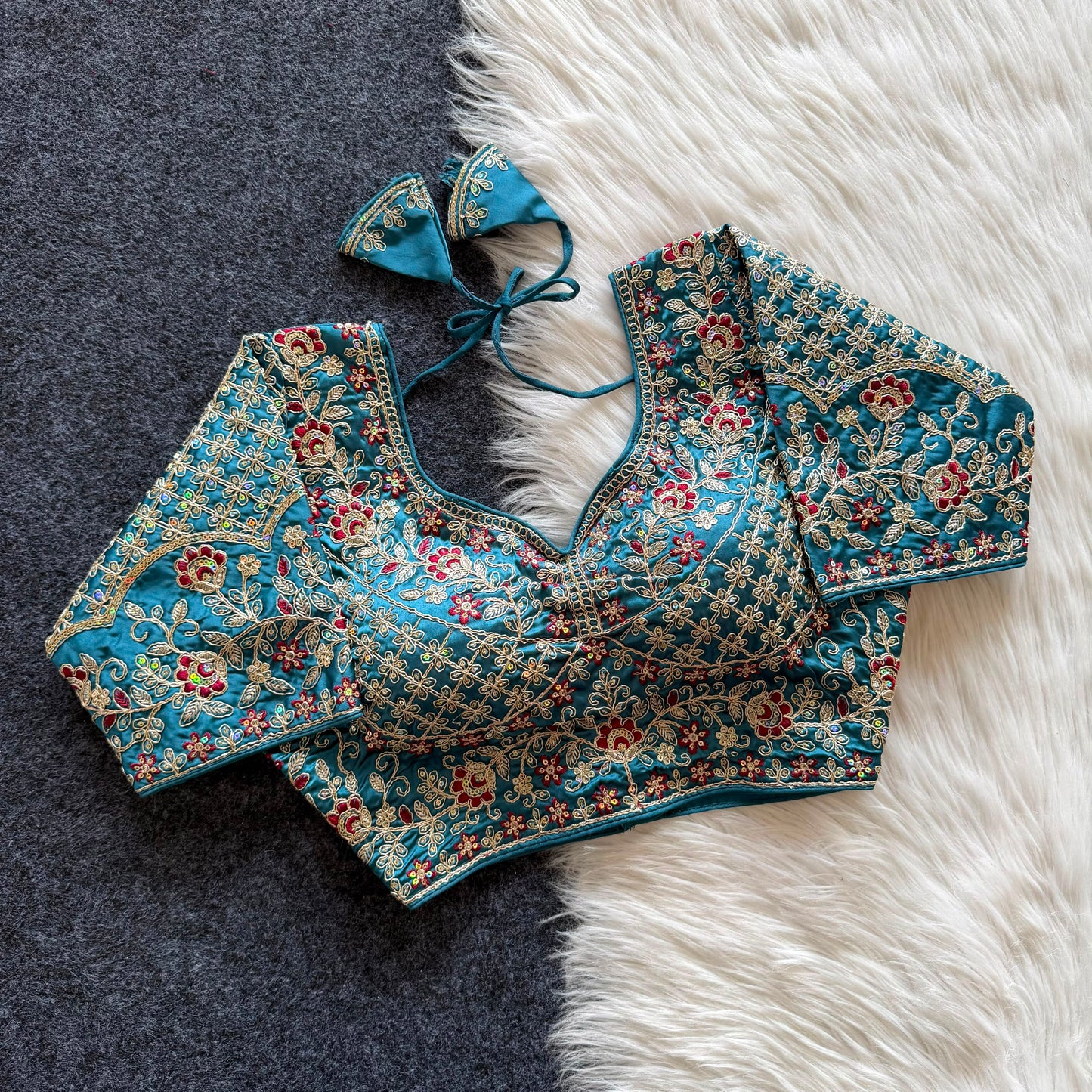 A beautiful  work with  sequins all over ready made blouse