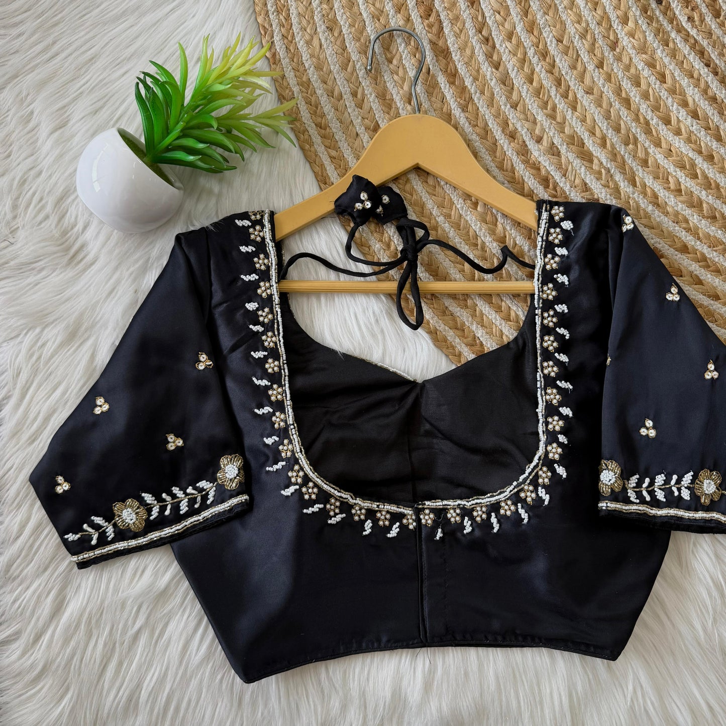 Beautiful handcrafted work in sleeves and back all over ready made blouse