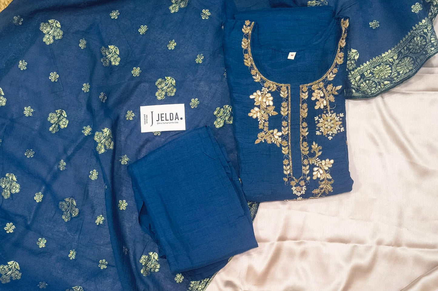 Exclusive silk with golden zari work salwar suit