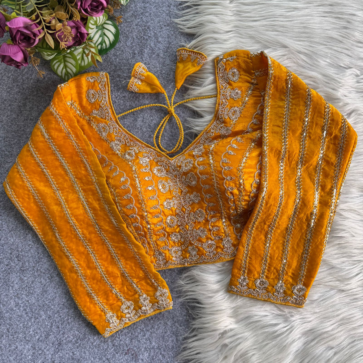 A beauty of golden embroidery work ready made blouse