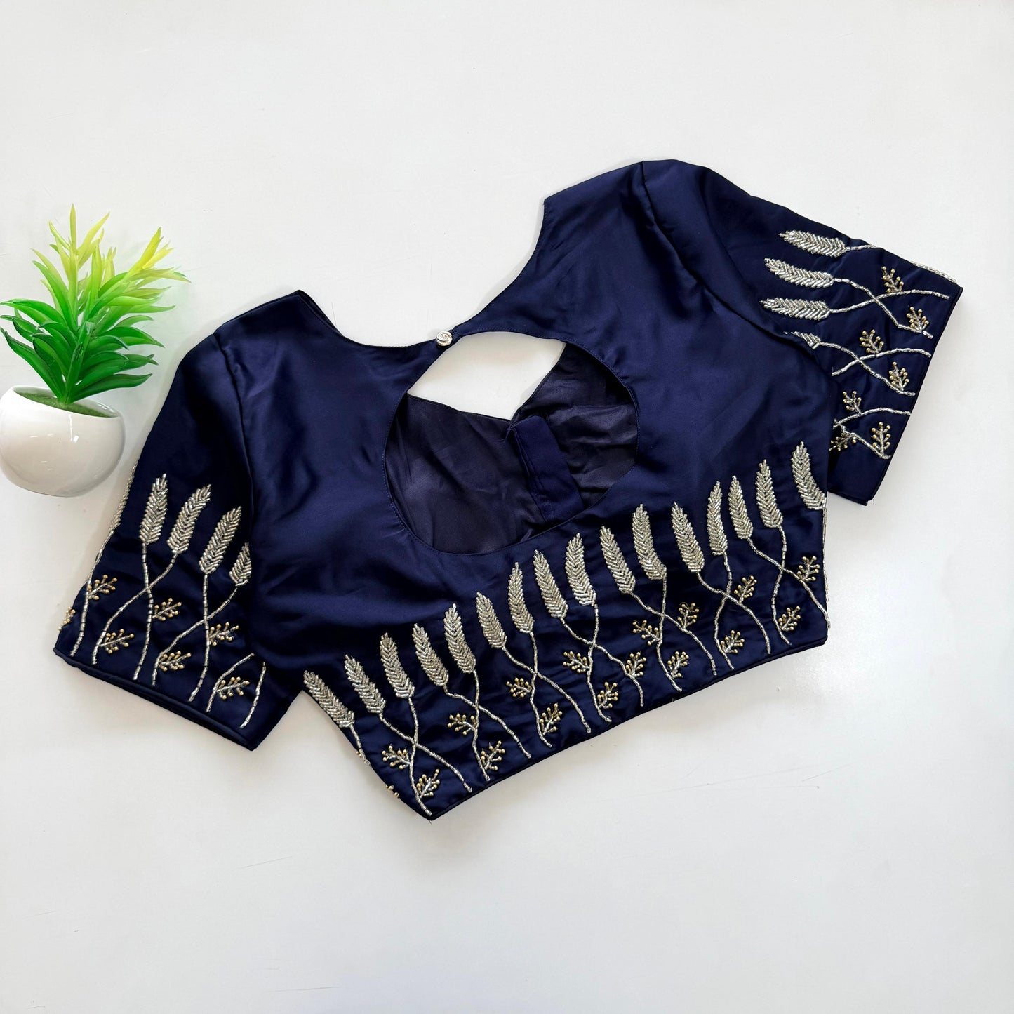 Beautiful handwork with pearl and kardana touch up all over ready made blouse