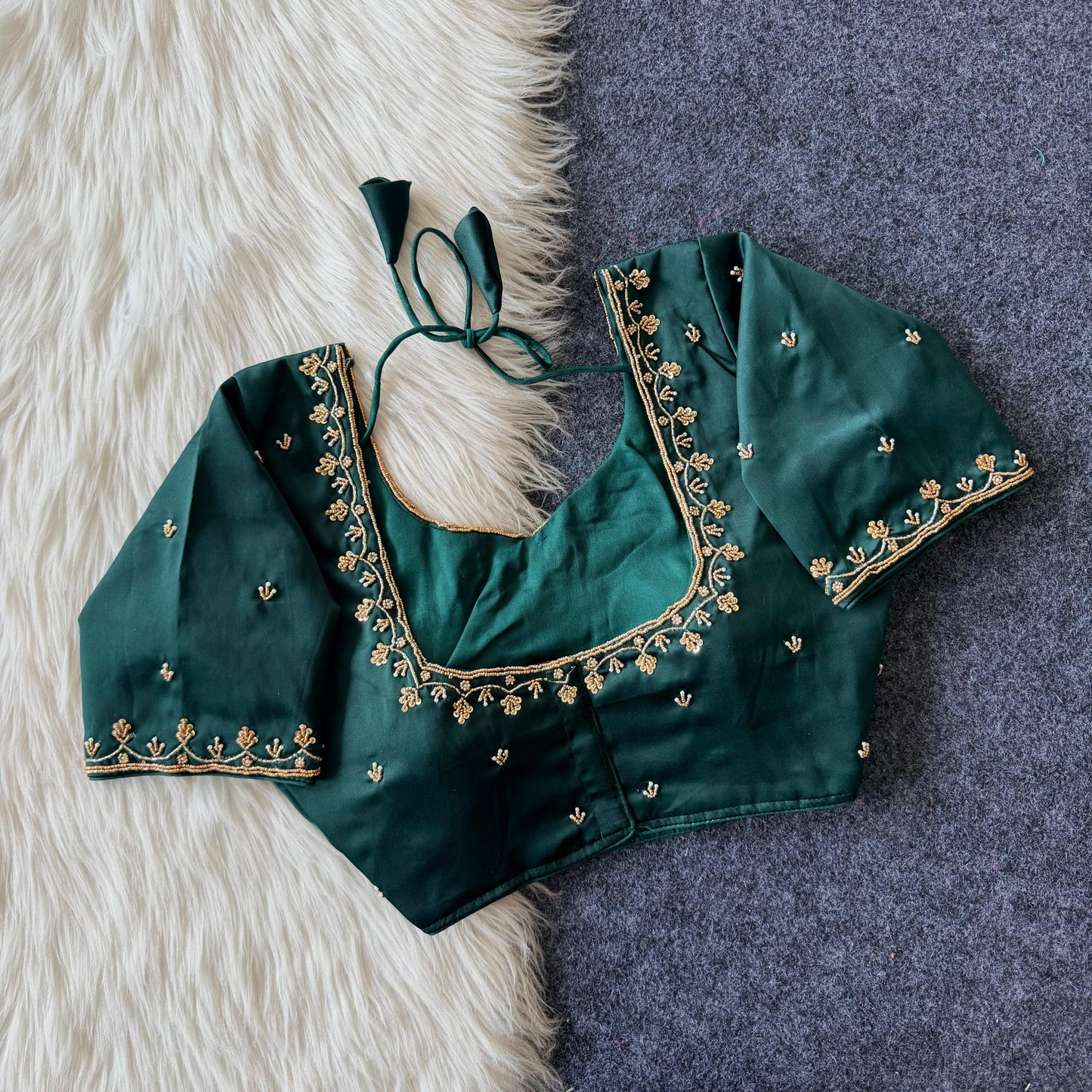 Beautiful handcrafted work in sleeves and back all over ready made blouse