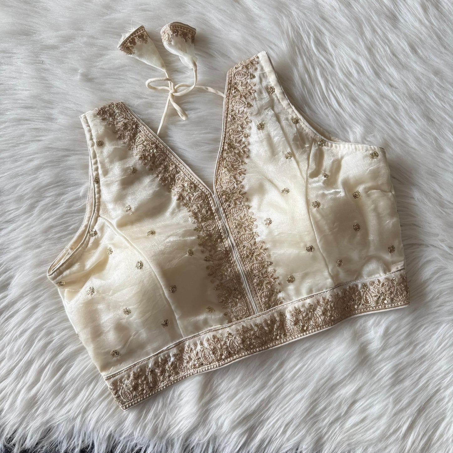 A beautiful work with sequins all over ready made blouse
