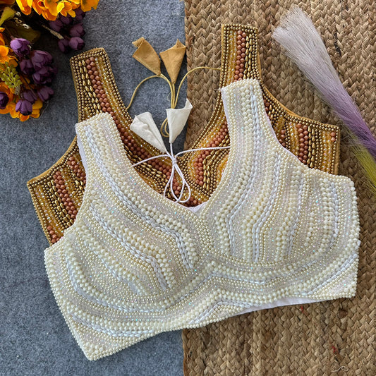Presenting beautiful handcrafted pearl work ready made blouse