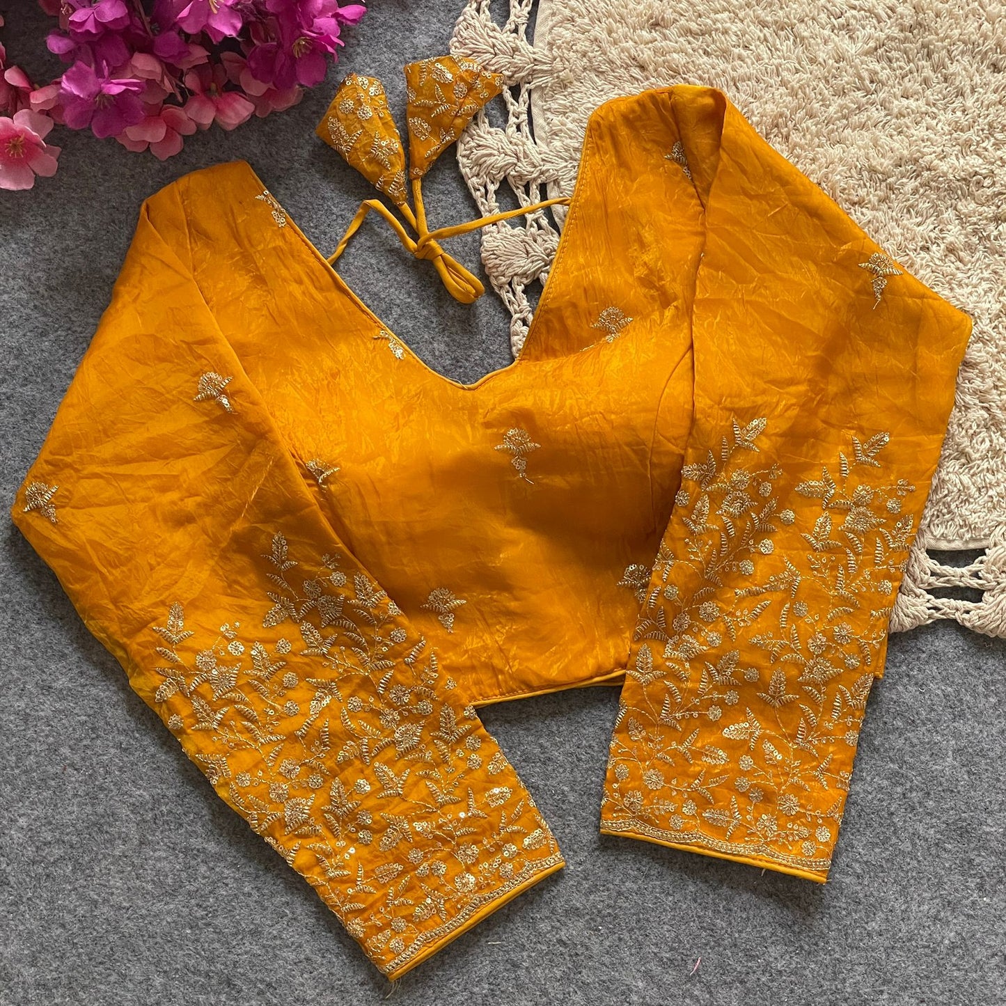 A beauty of golden embroidery work ready made blouse
