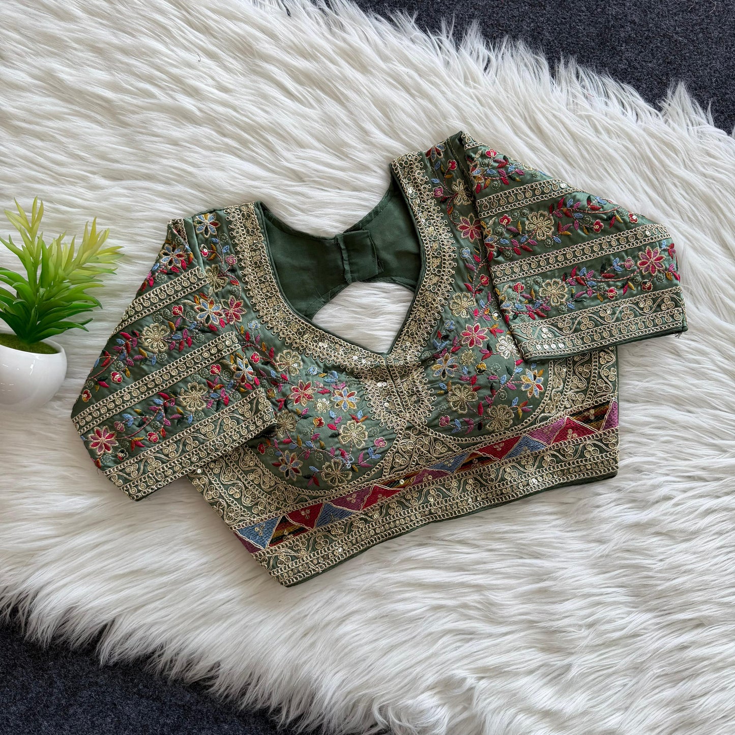 A beautiful work with sequins all over ready made blouse
