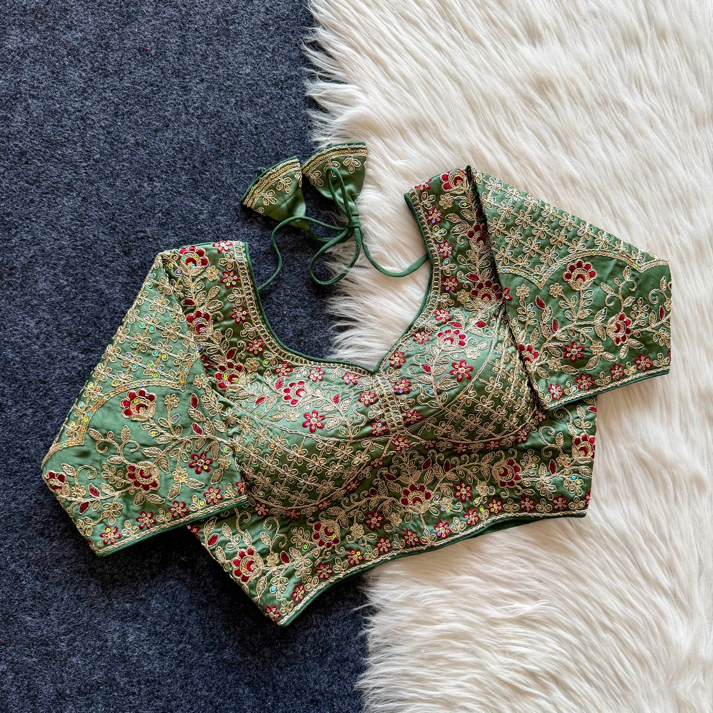 A beautiful  work with  sequins all over ready made blouse
