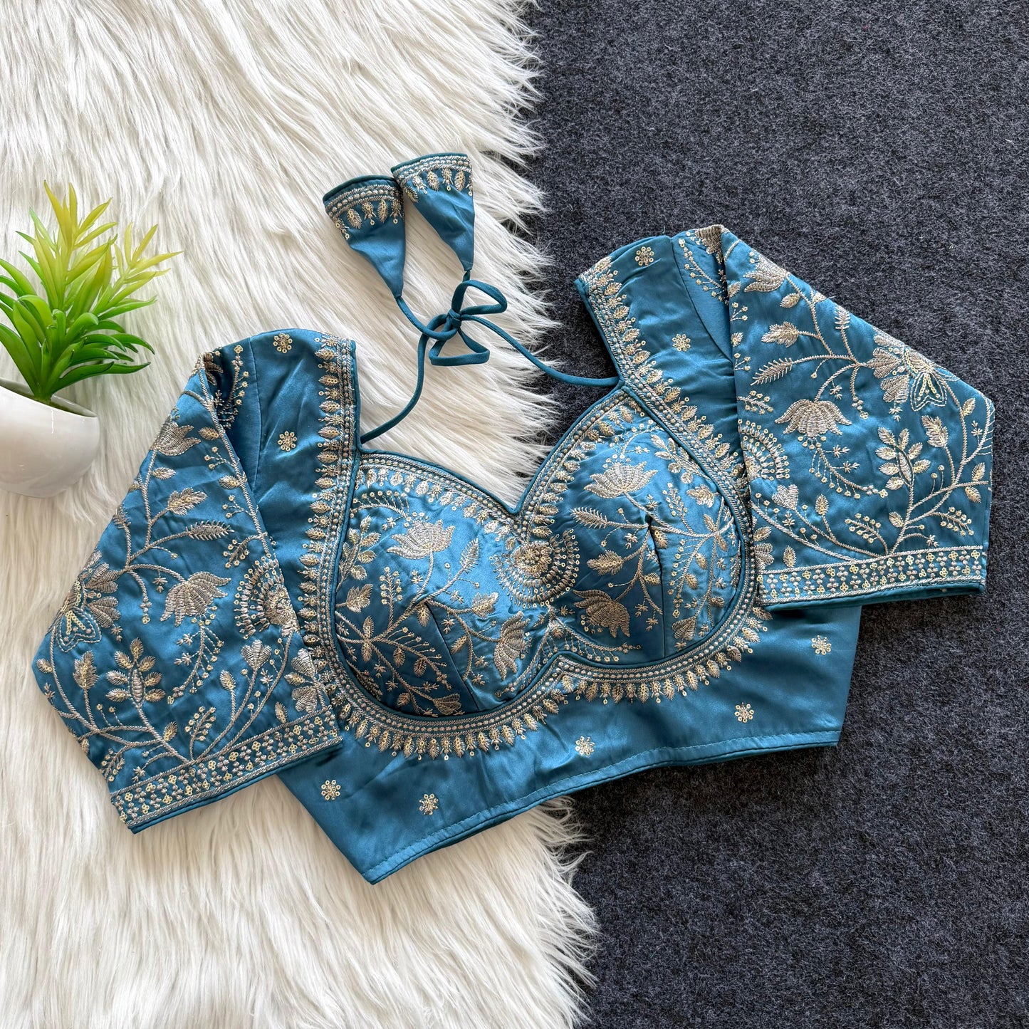 A beautiful  work with  sequence all over ready made blouse