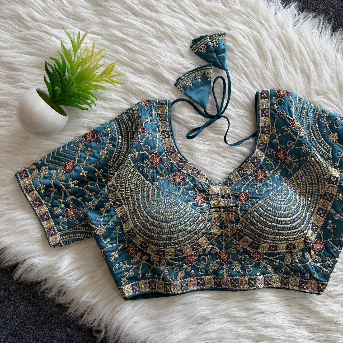A beautiful work with sequins all over ready made blouse