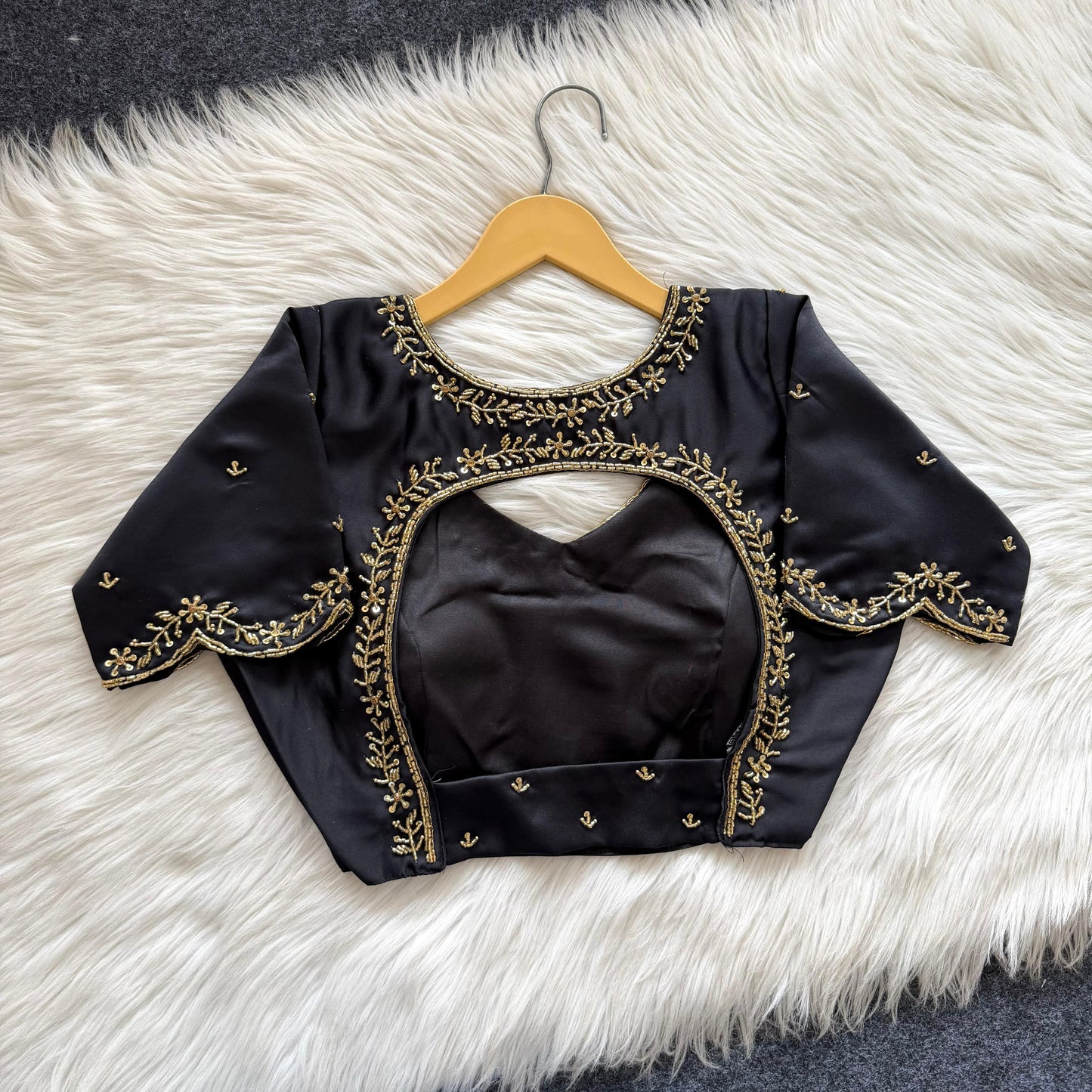 Beautiful handcrafted work in sleeves and back all over ready made blouse