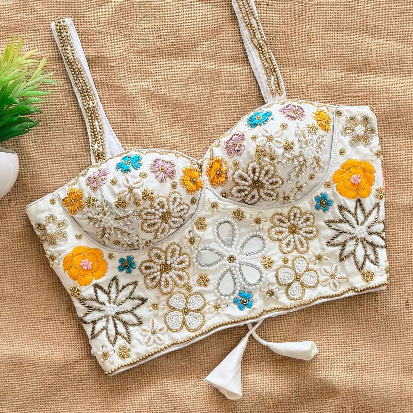 Beautiful handcrafted work all over with real mirror touch up and heavy thread all over ready made blouse