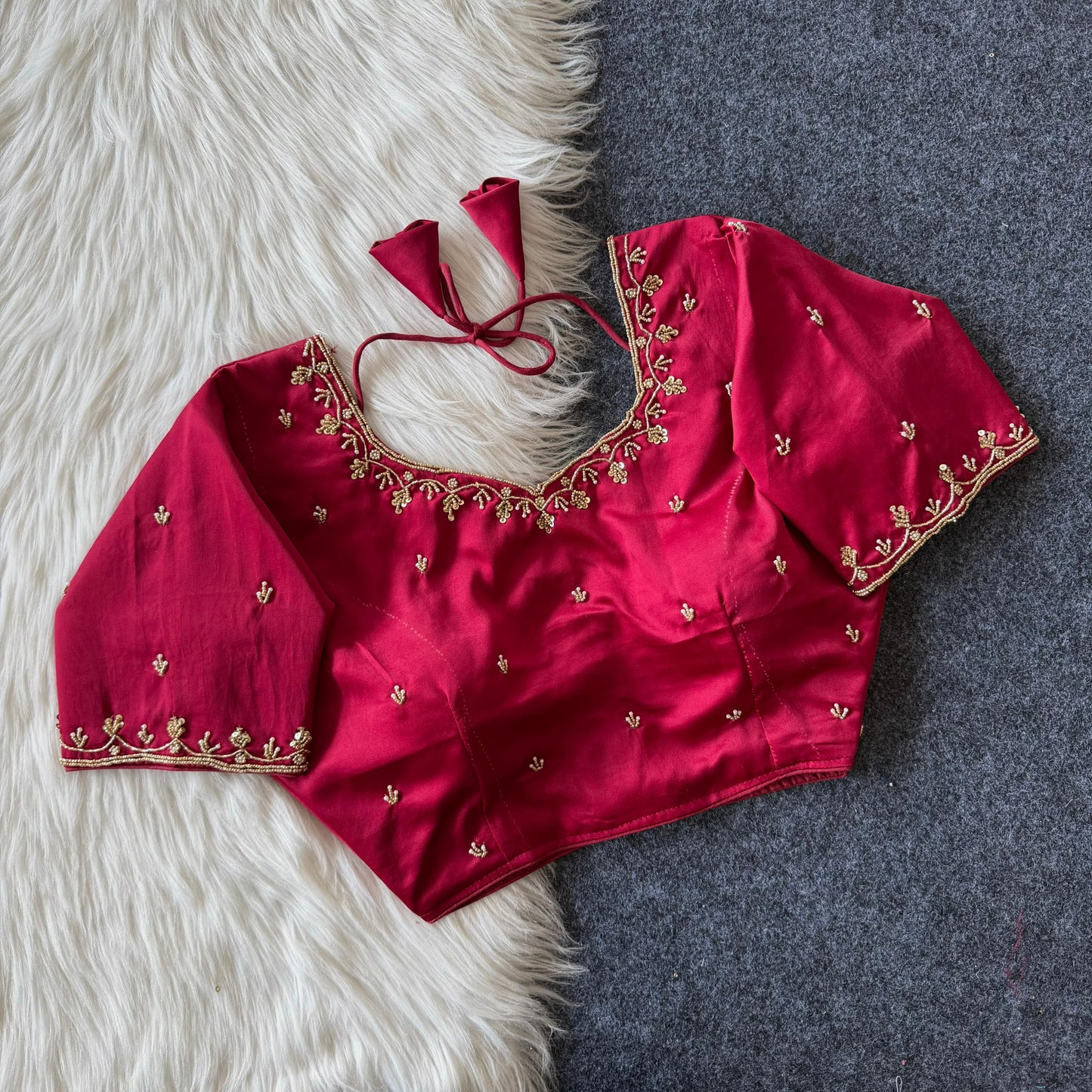 Beautiful handcrafted work in sleeves and back all over ready made blouse
