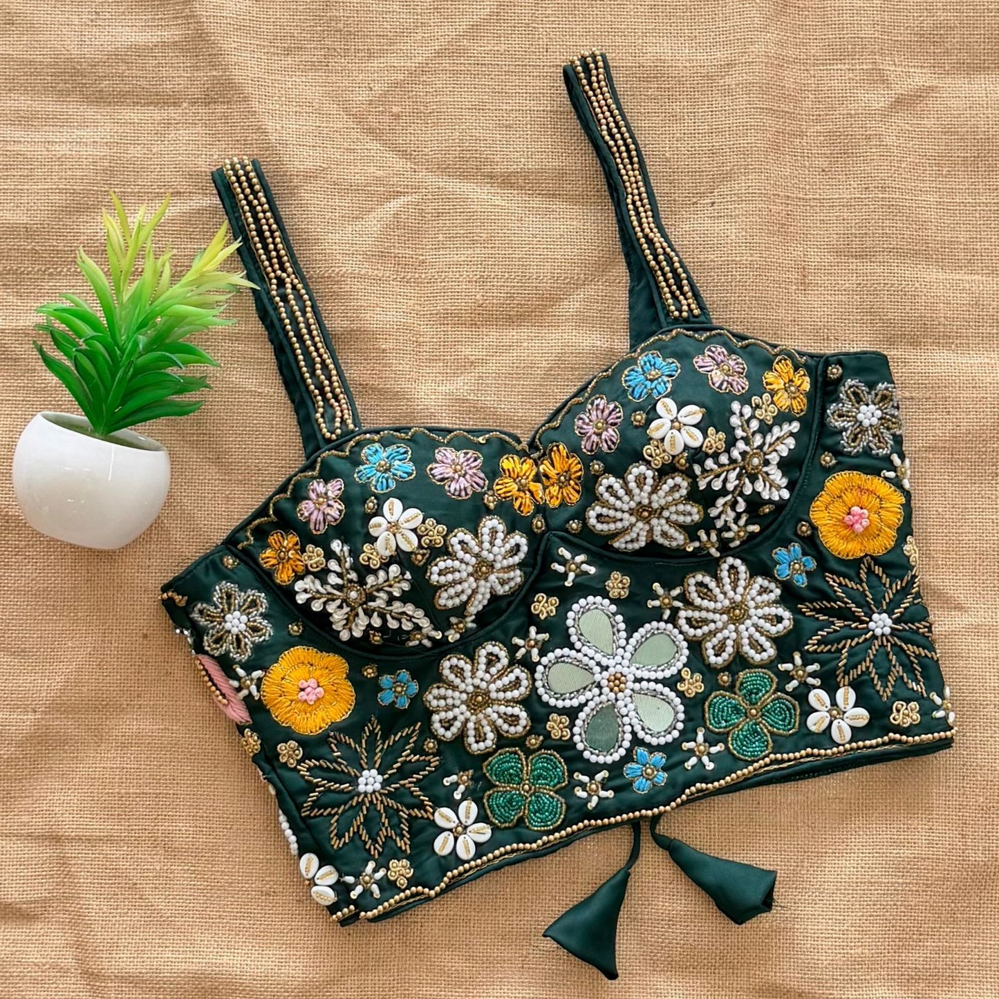 Beautiful handcrafted work all over with real mirror touch up and heavy thread all over ready made blouse