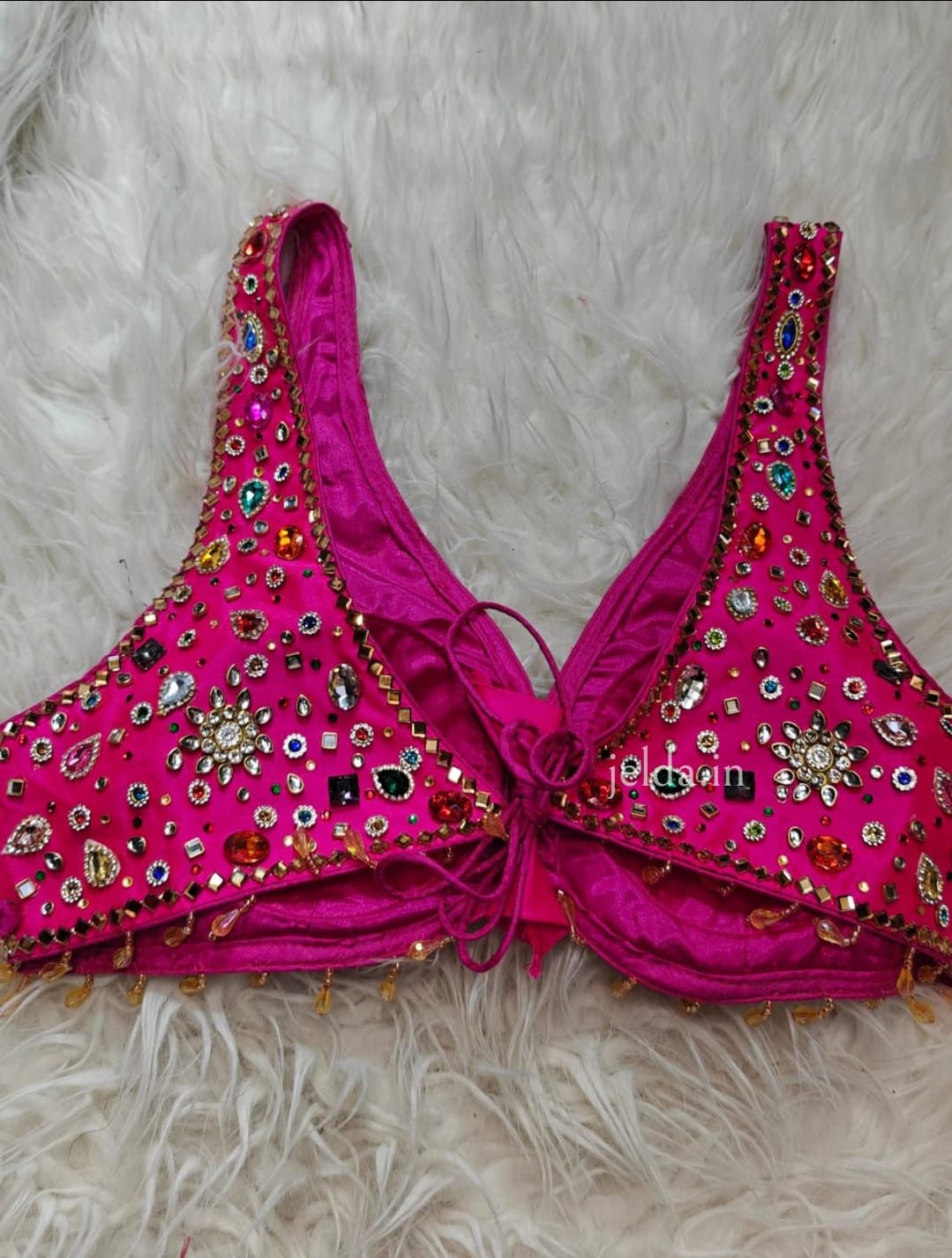Exclusive jewellary stone work sleeveless custom made blouse