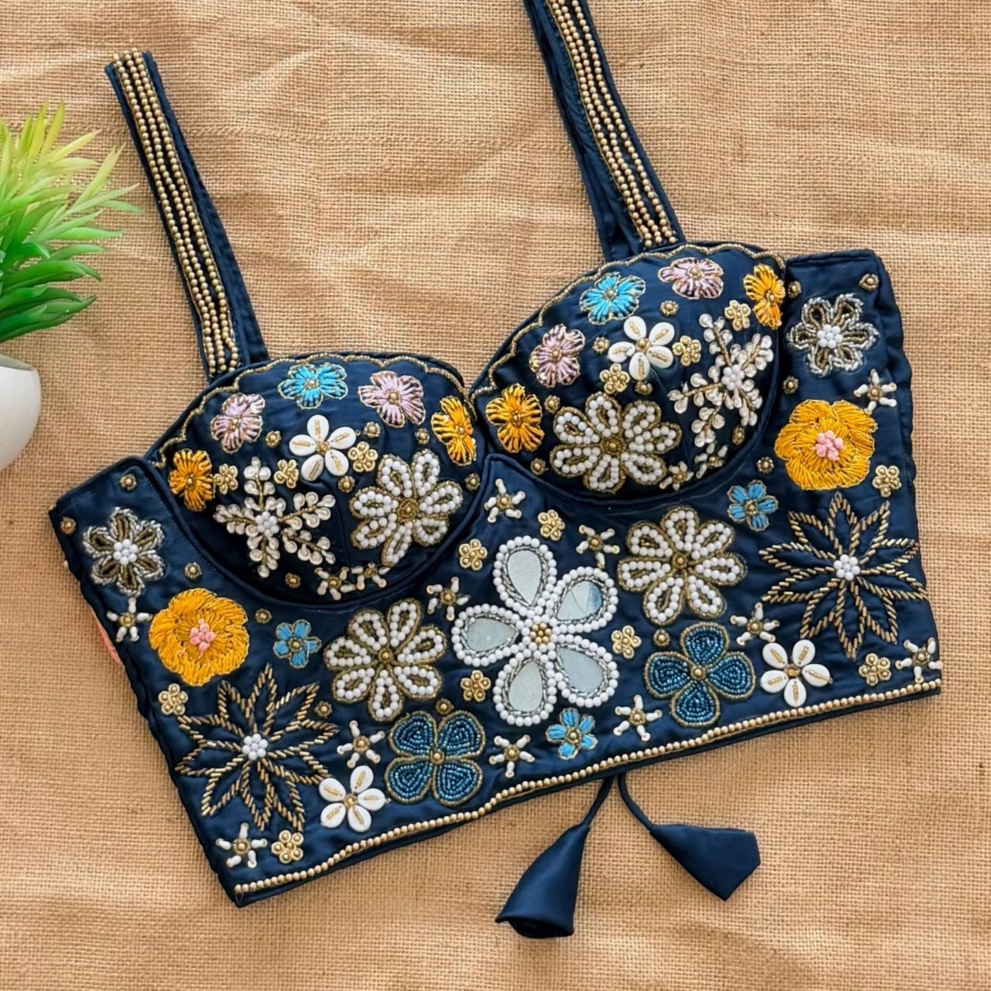 Beautiful handcrafted work all over with real mirror touch up and heavy thread all over ready made blouse
