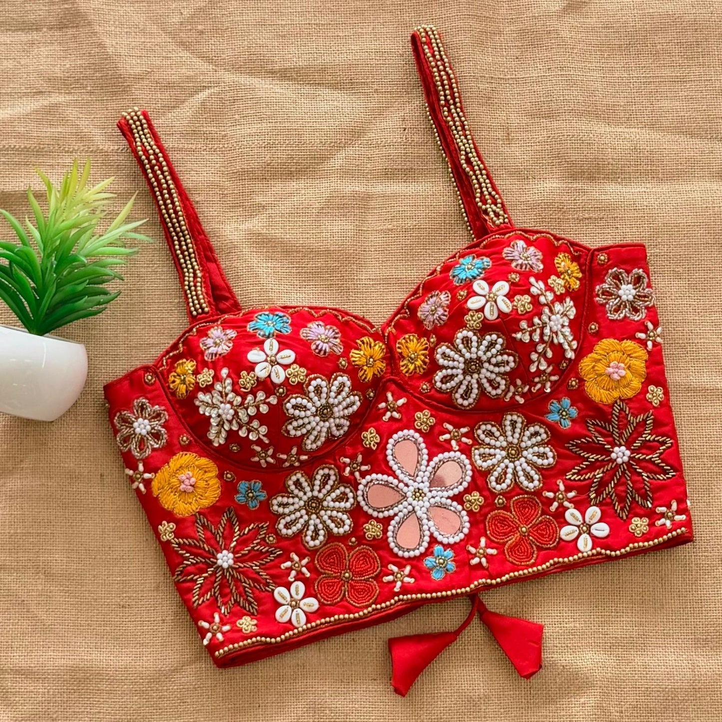 Beautiful handcrafted work all over with real mirror touch up and heavy thread all over ready made blouse