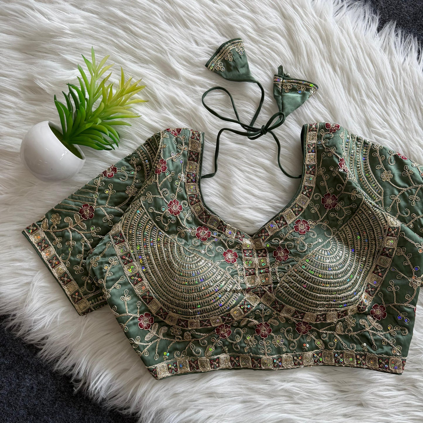A beautiful work with sequins all over ready made blouse
