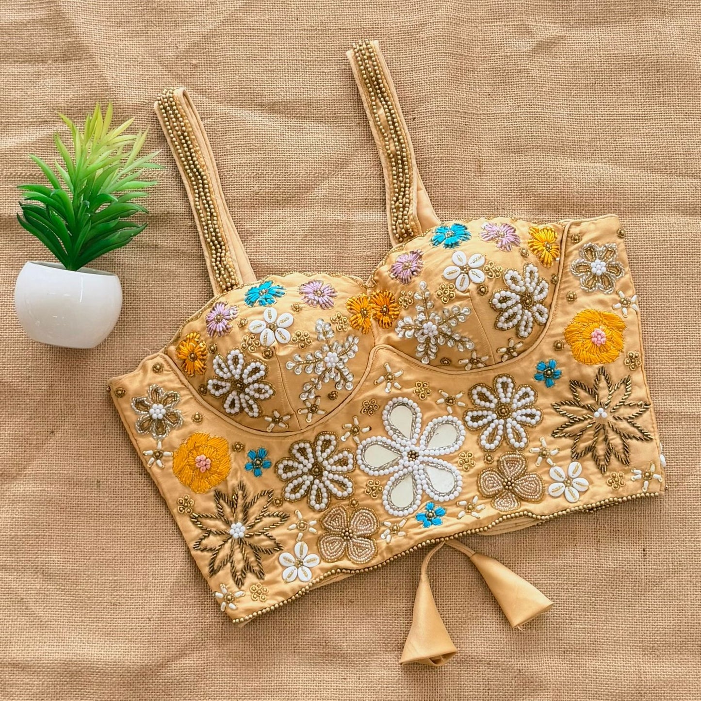 Beautiful handcrafted work all over with real mirror touch up and heavy thread all over ready made blouse