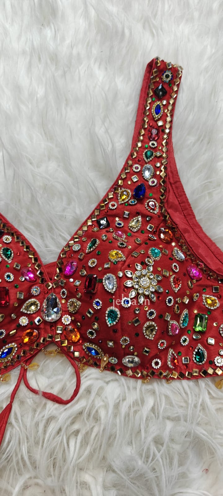 Exclusive jewellary stone work sleeveless custom made blouse