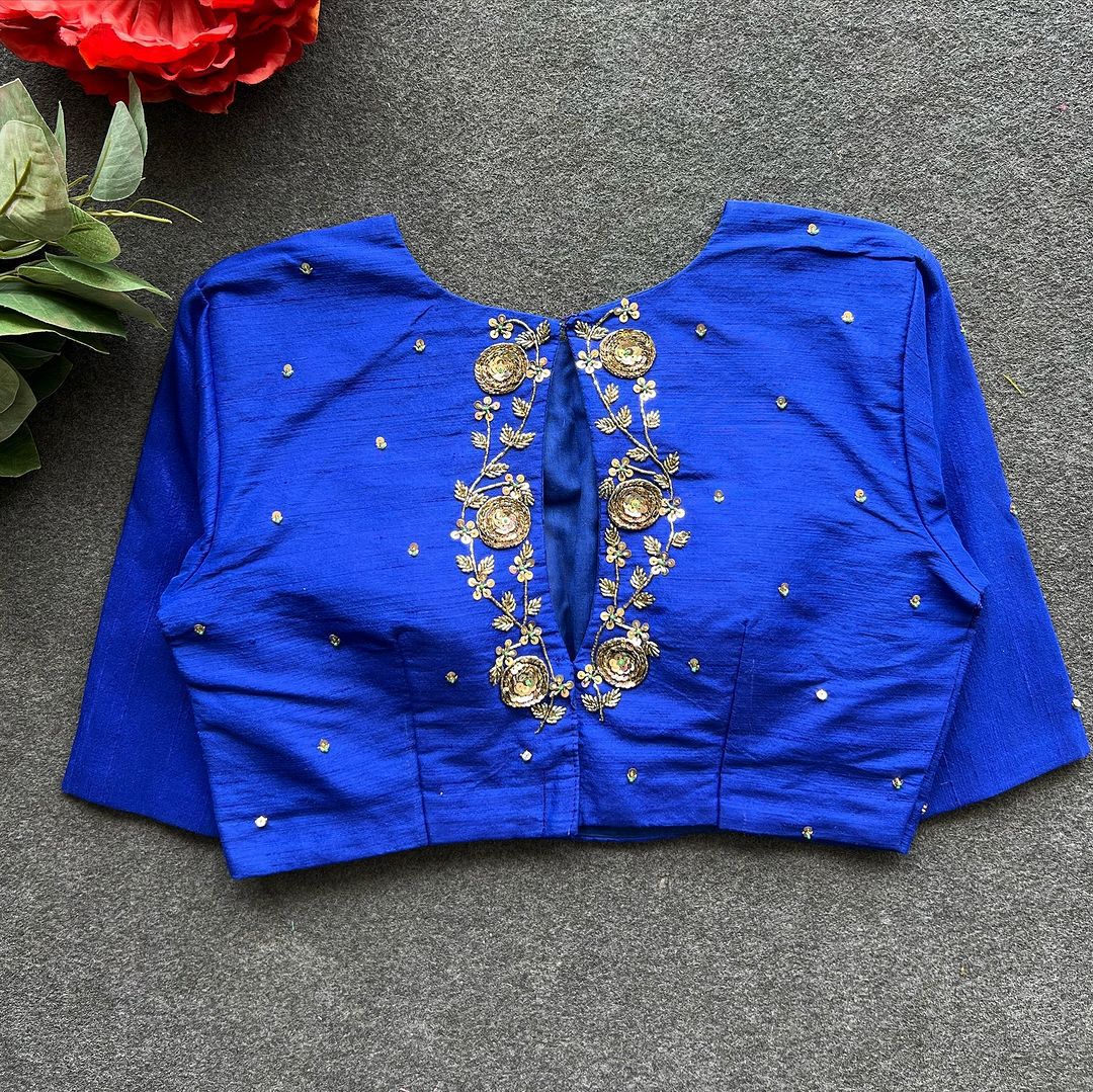A beauty of golden handwork all over ready made blouse