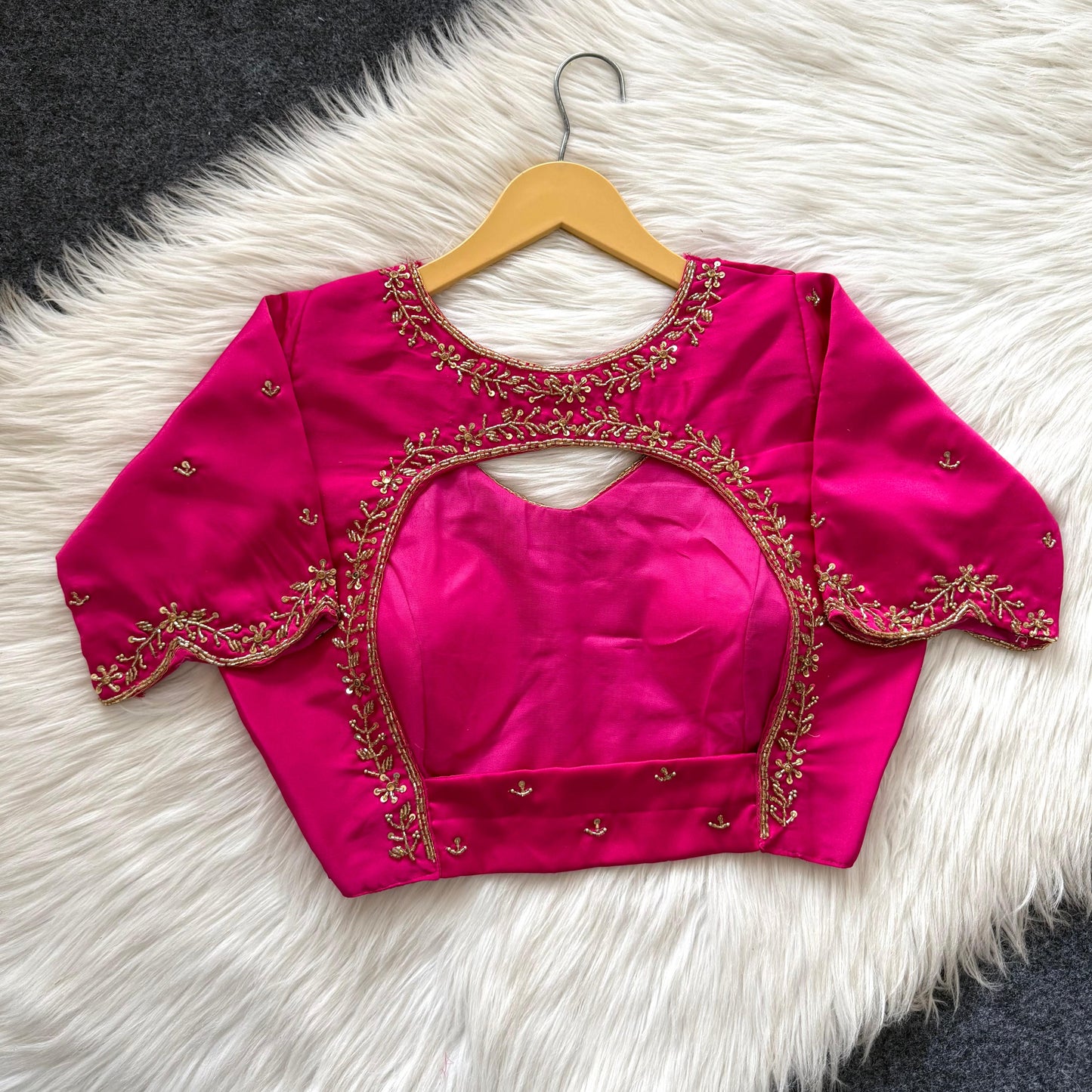 Beautiful handcrafted work in sleeves and back all over ready made blouse