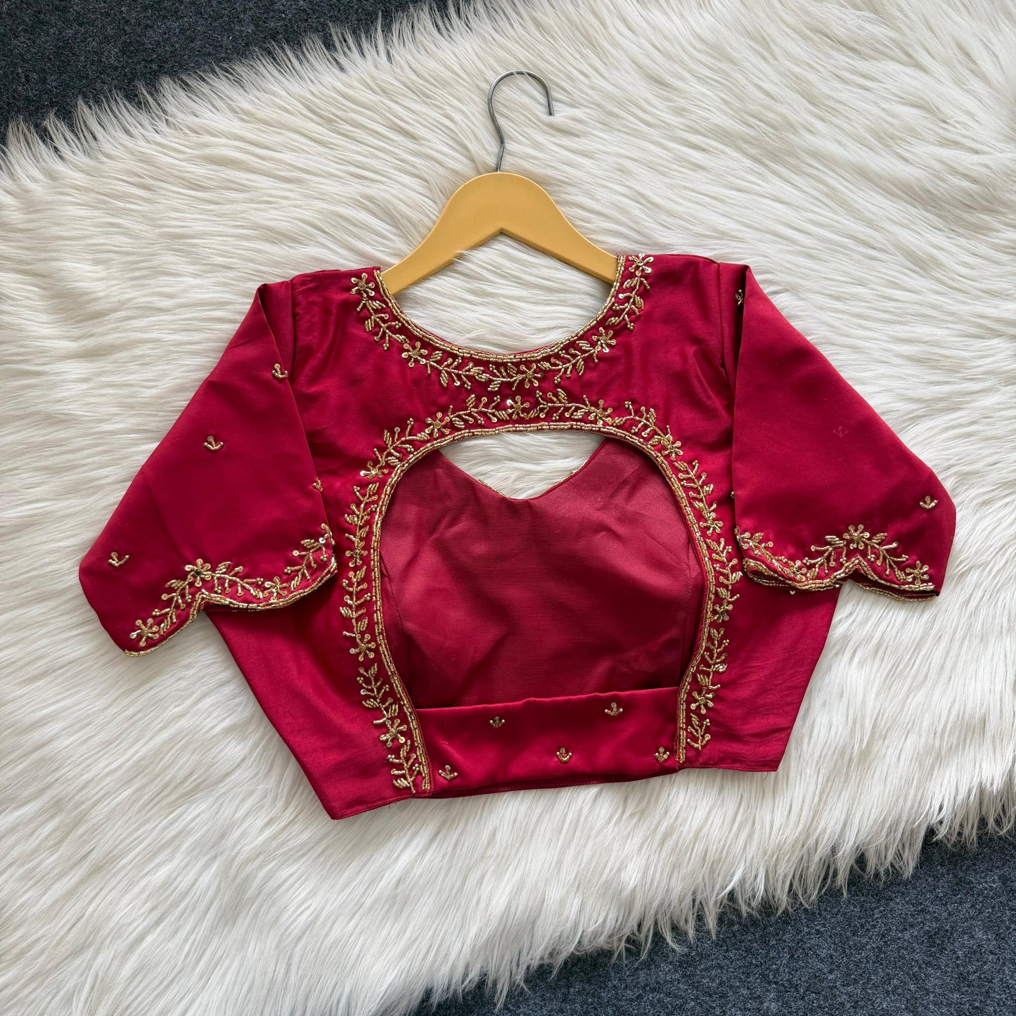 Beautiful handcrafted work in sleeves and back all over ready made blouse